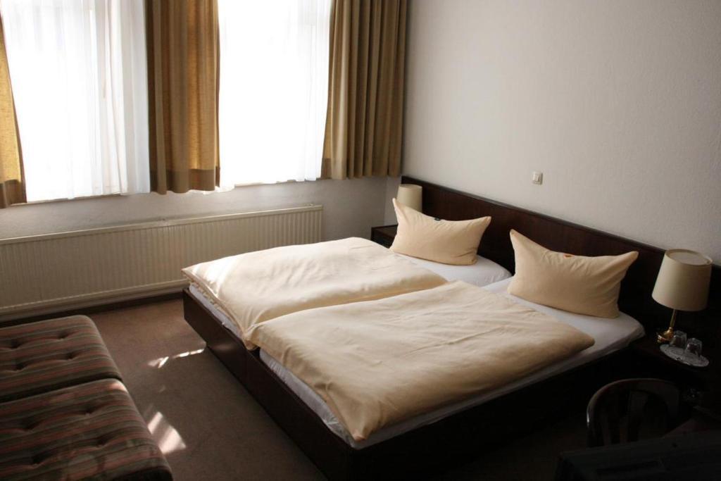 Hotel Diening Essen Habitación foto