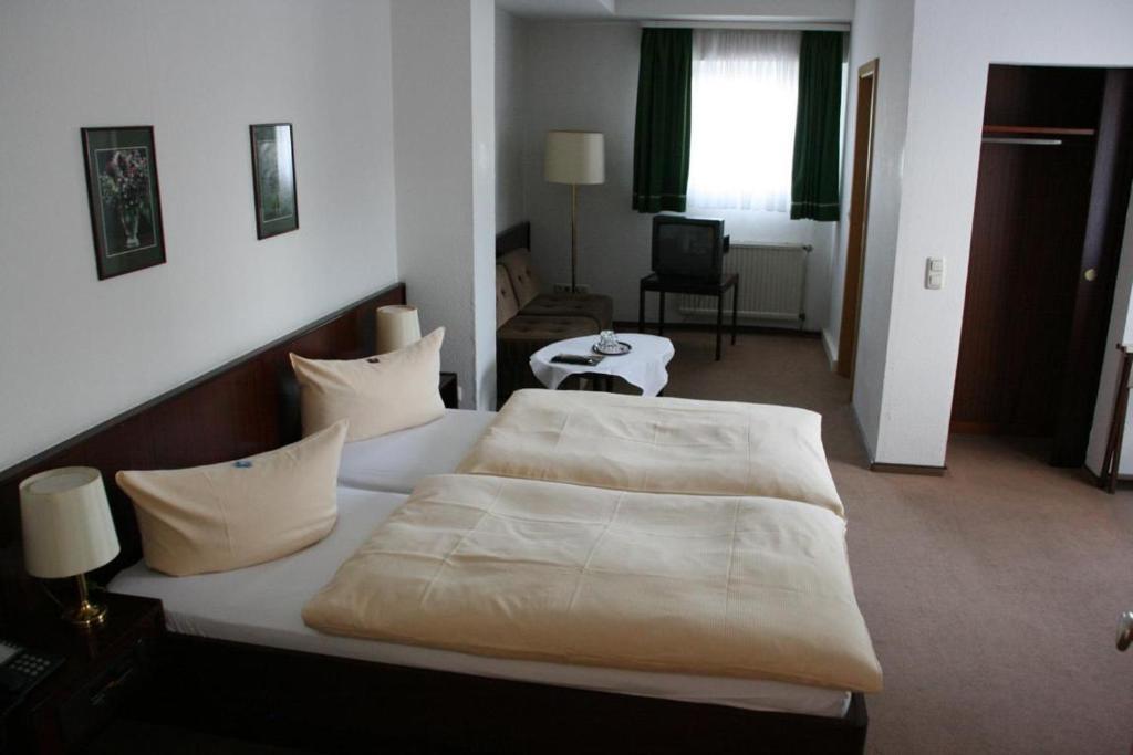 Hotel Diening Essen Habitación foto
